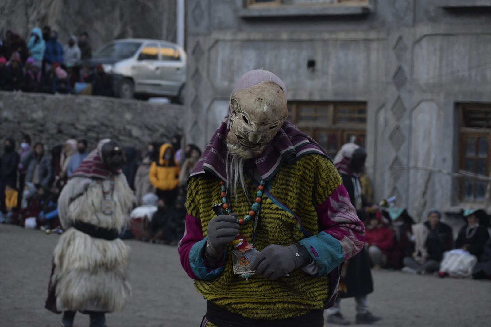 Villagers gathered for a masked cham dance in Ladakh